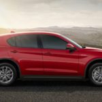 Alfa Romeo Stelvio Super Rossa Fianco in noleggio thumbnail
