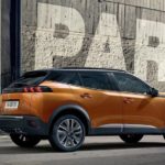 Peugeot e-2008 elettrica fianco thumbnail